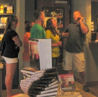 Family screaming they are DEBT FREE in the lobby.
